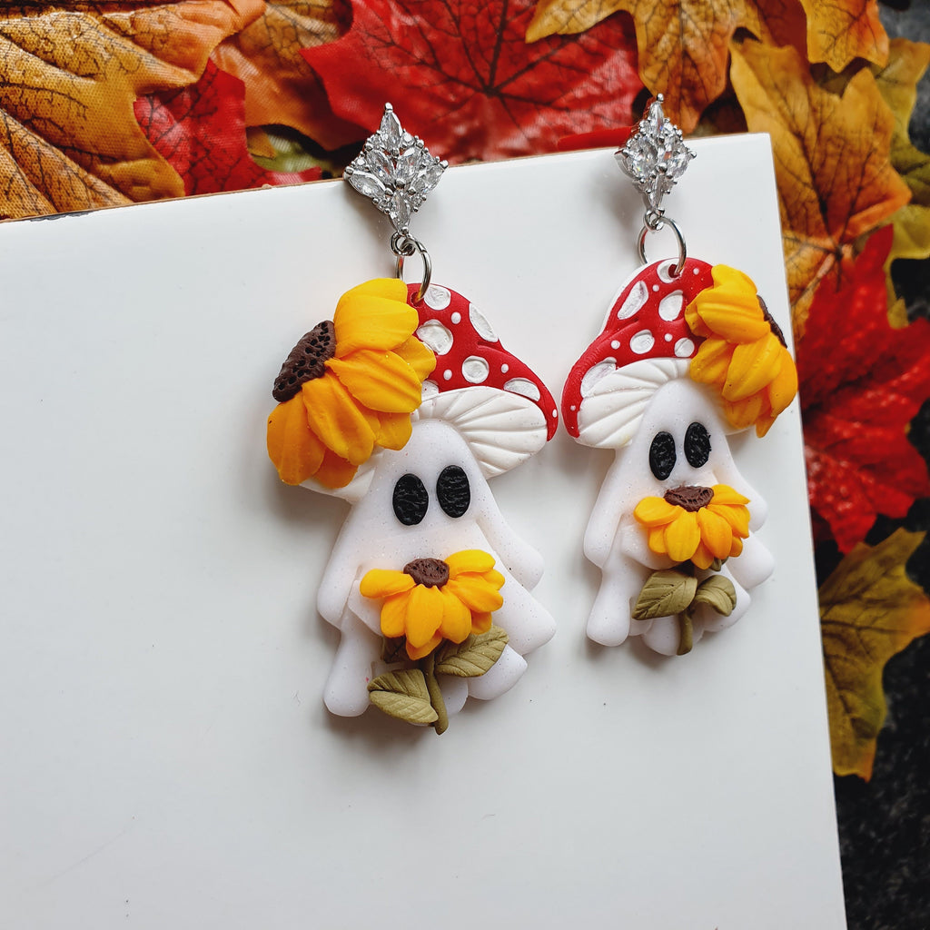 Shimmery Ghost Earrings: Handmade Clay Sunflower Jewelry