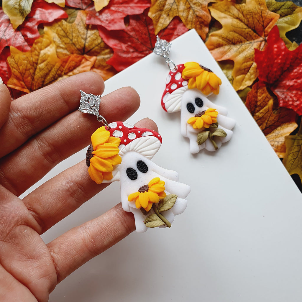 Shimmery Ghost Earrings: Handmade Clay Sunflower Jewelry