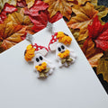 Shimmery Ghost Earrings: Handmade Clay Sunflower Jewelry