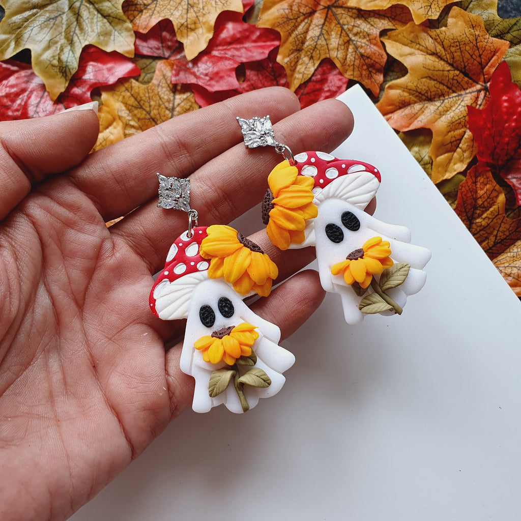 Shimmery Ghost Earrings: Handmade Clay Sunflower Jewelry