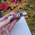 Spooky Bookcase Hair Clip: Handmade Clay Halloween Accessory