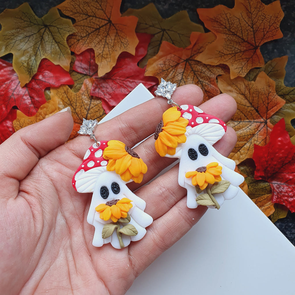 Shimmery Ghost Earrings: Handmade Clay Sunflower Jewelry