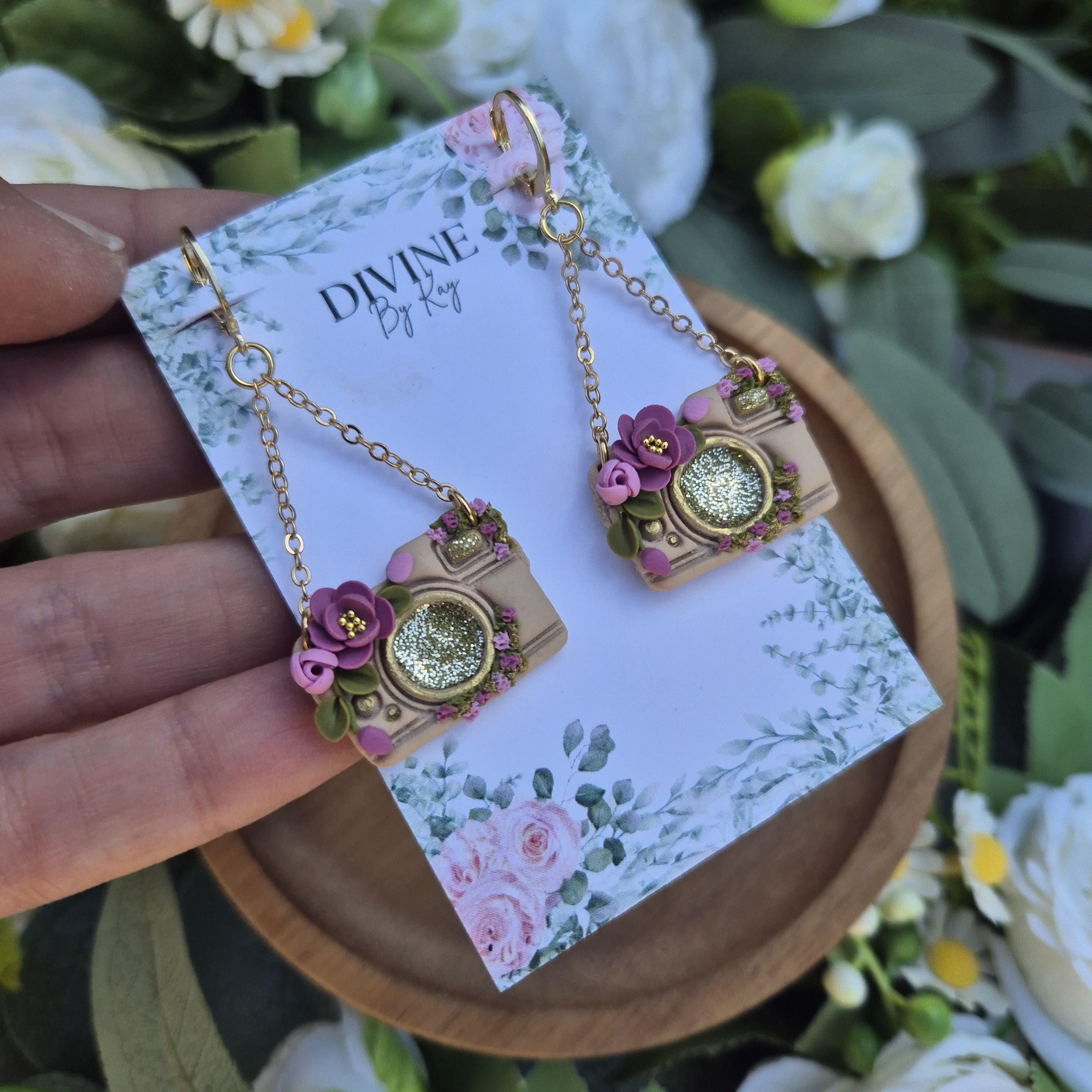 Handmade Clay Camera Dangle Earrings: Floral Sparkle, Surgical Steel