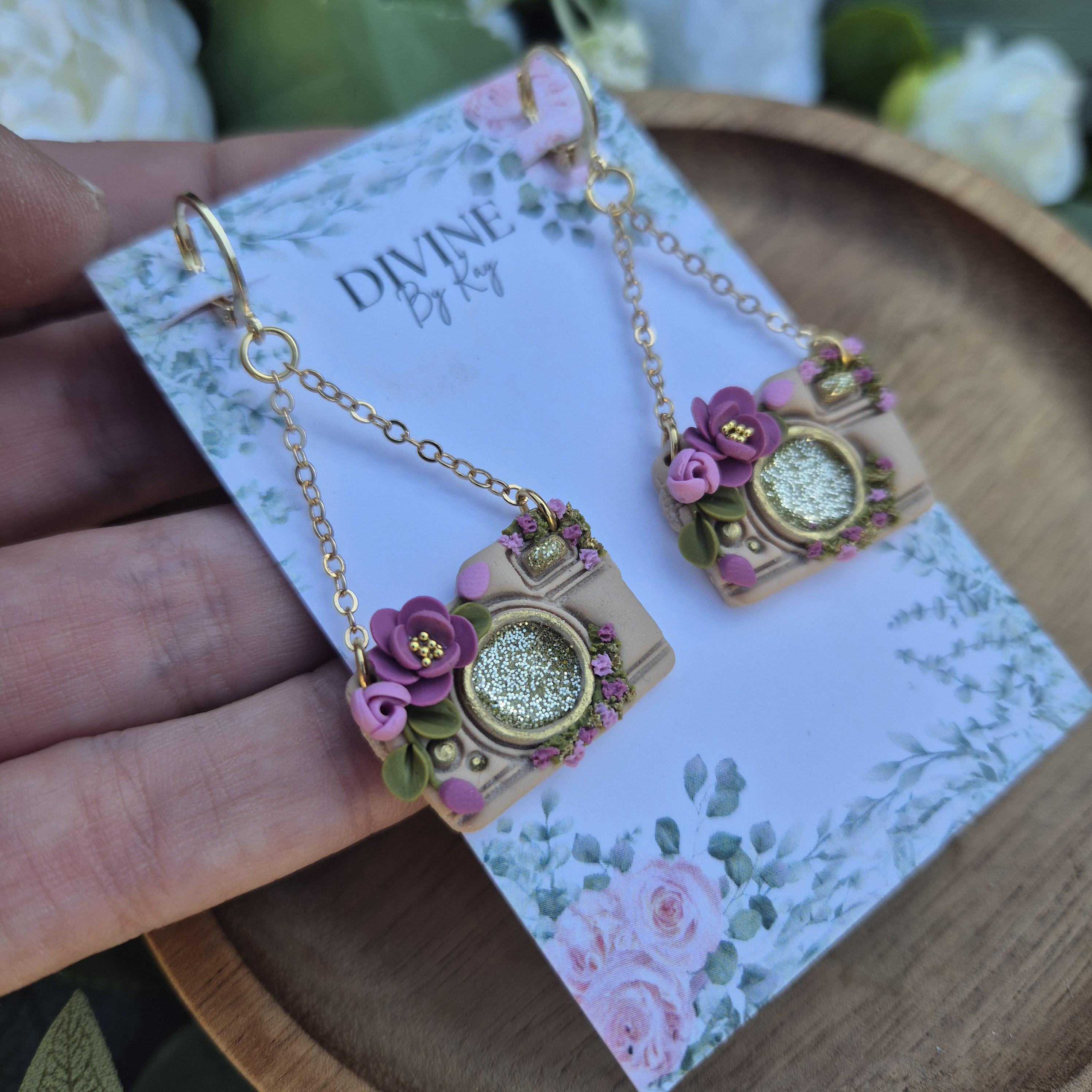 Handmade Clay Camera Dangle Earrings: Floral Sparkle, Surgical Steel