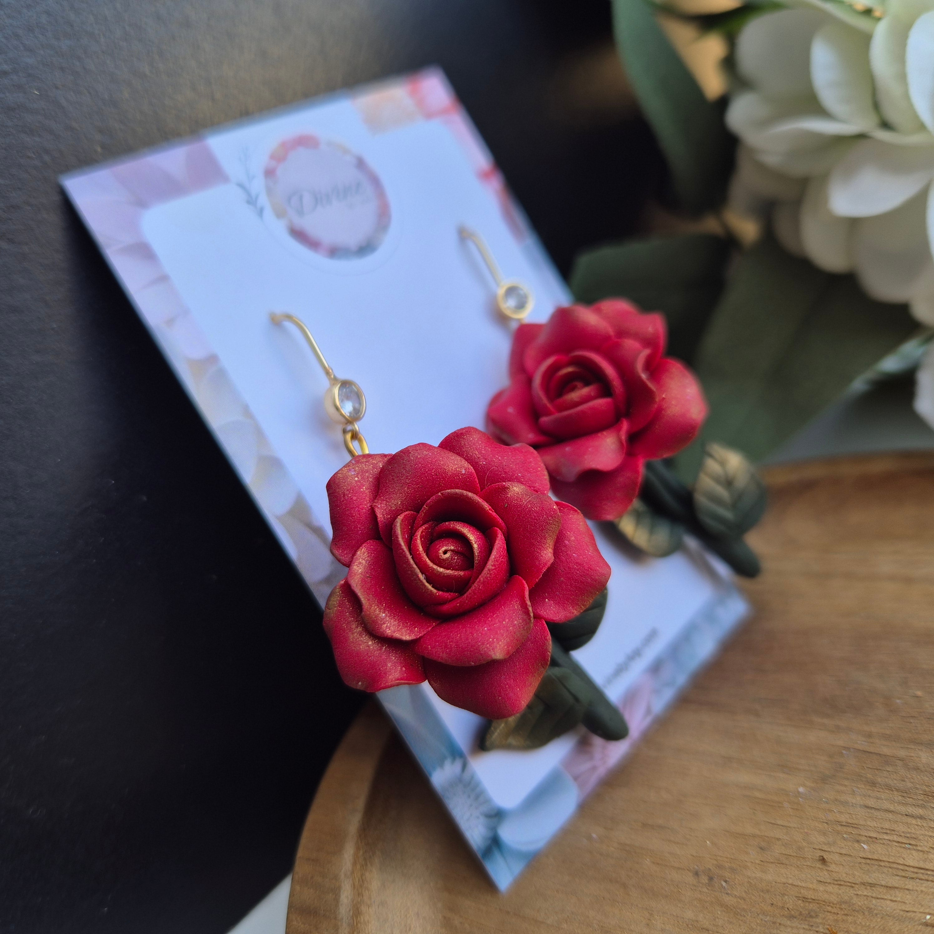 Rose dangle earrings