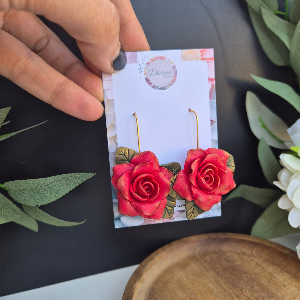 Rose dangle earrings